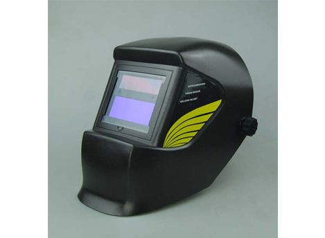 Auto-darkening welding helmet