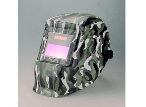 Auto-darkening welding helmet