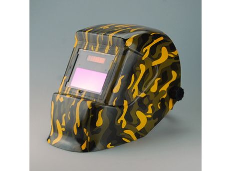 Auto-darkening welding helmet