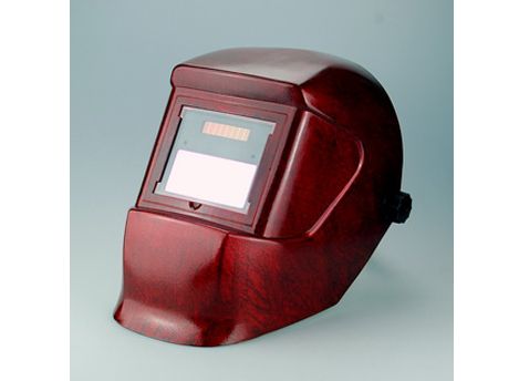 Auto-darkening welding helmet