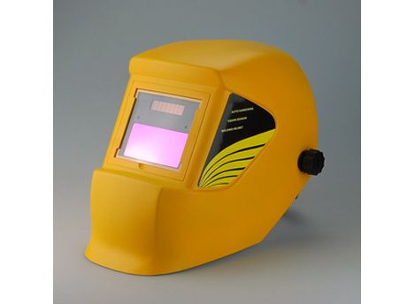 Auto-darkening welding helmet