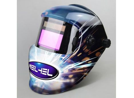 Auto-darkening welding helmet