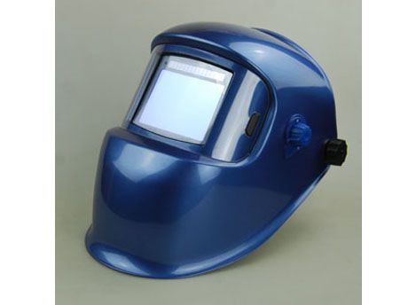 Auto-darkening welding helmet