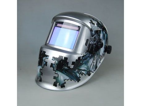 Auto-darkening welding helmet