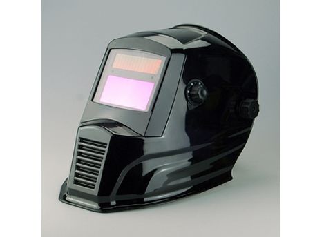 Auto-darkening welding helmet