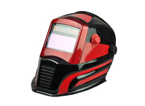 Auto-darkening welding helmet