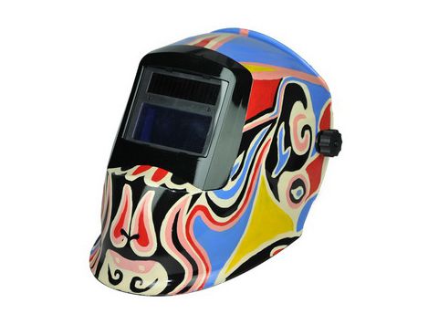 Auto-darkening welding helmet