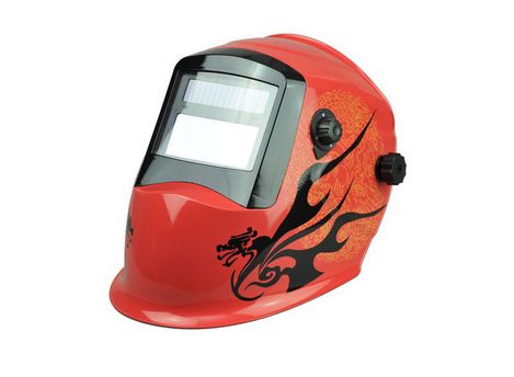 Auto-darkening welding helmet