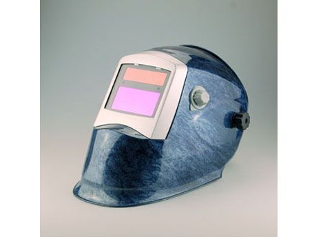 Auto-darkening welding helmet