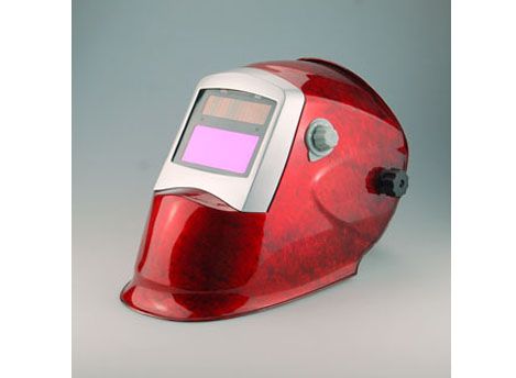 Auto-darkening welding helmet