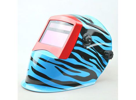 Auto-darkening welding helmet