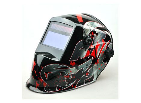 Auto-darkening welding helmet