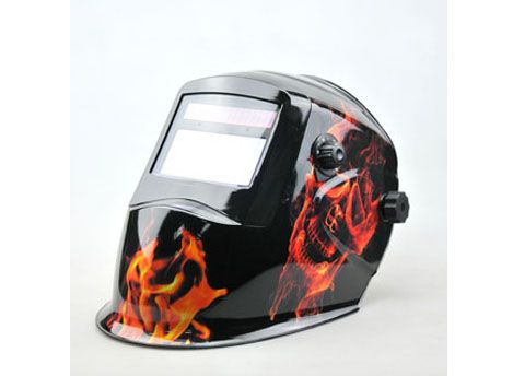 Auto-darkening welding helmet