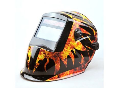 Auto-darkening welding helmet