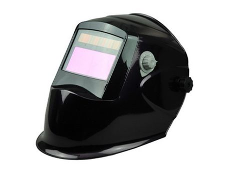 Auto-darkening welding helmet