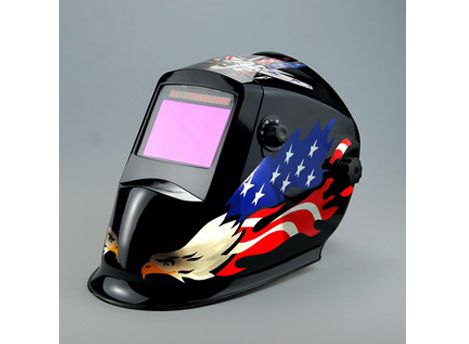 Auto-darkening welding helmet