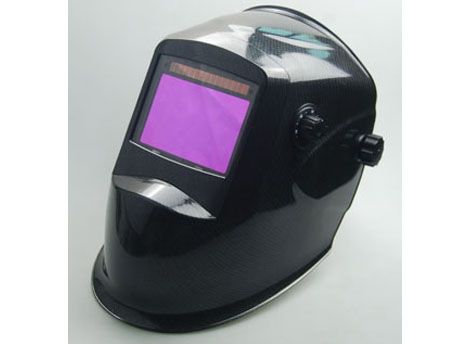 Auto-darkening welding helmet