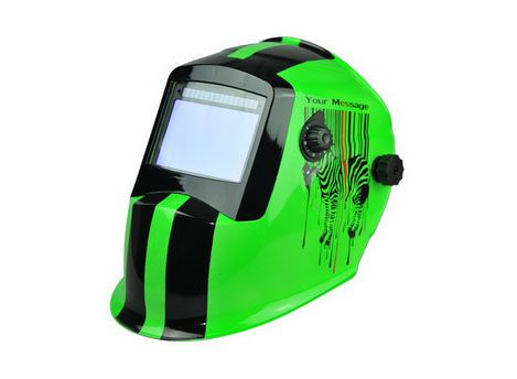 Auto-darkening welding helmet