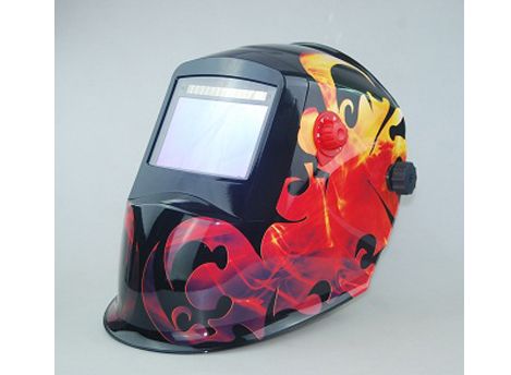 Auto-darkening welding helmet