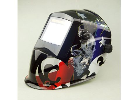Auto-darkening welding helmet