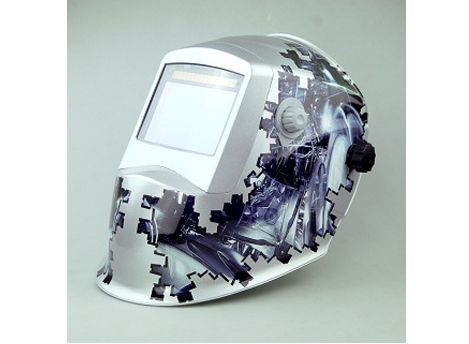 Auto-darkening welding helmet