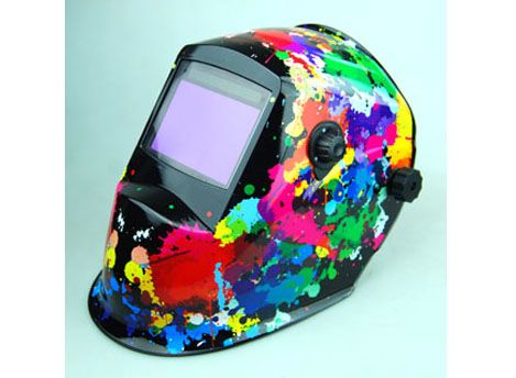 Auto-darkening welding helmet