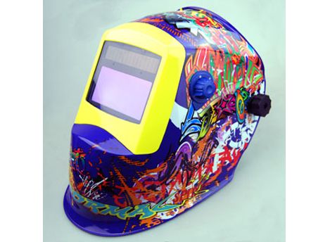 Auto-darkening welding helmet