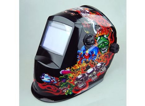 Auto-darkening welding helmet