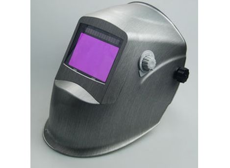 Auto-darkening welding helmet