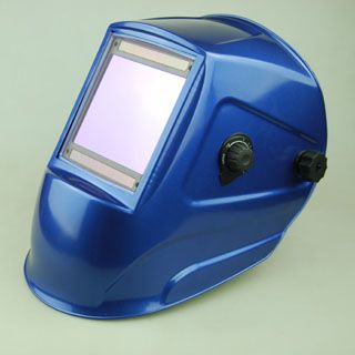 Auto-darkening welding helmet