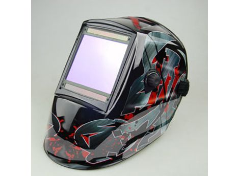 Auto-darkening welding helmet